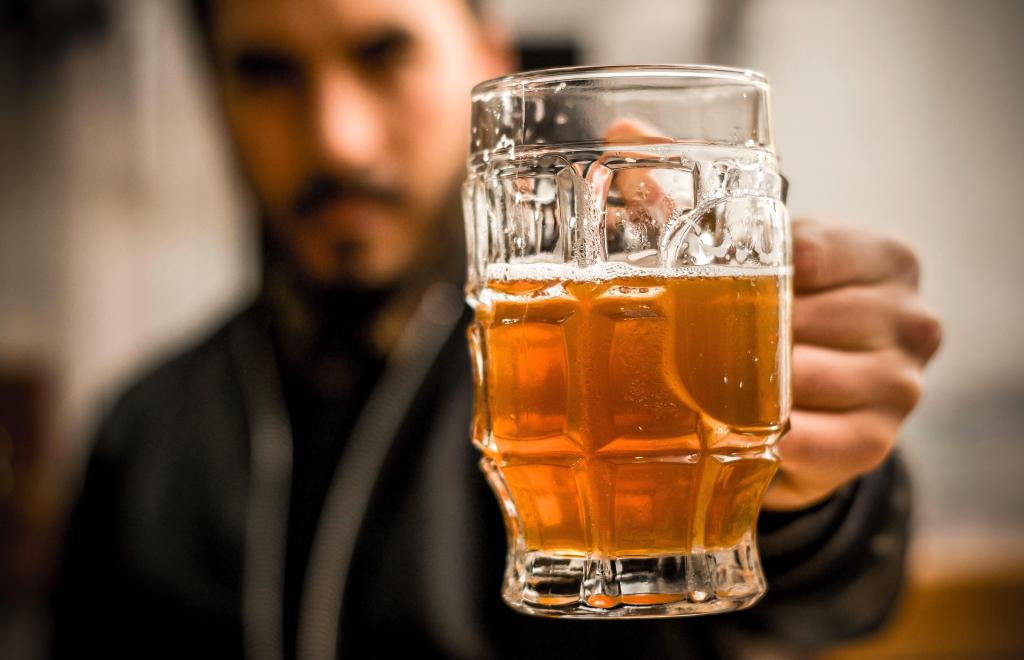 Man holding craft beer