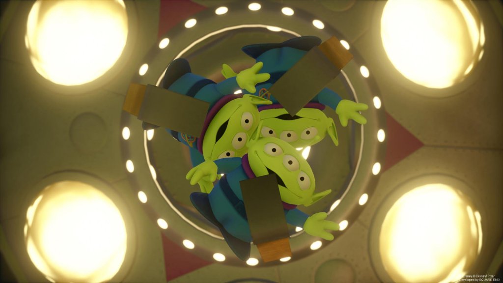 The claw aliens from Toy Story dangle beneath warm lights at the start of Cam Kunzelman's top games list for 2019