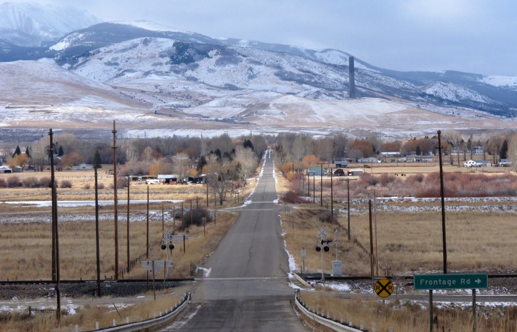 This Dec. 13, 2016 photo shows the old Anaconda smelter smokestack in the background behind the community of Opportunity, Mont.