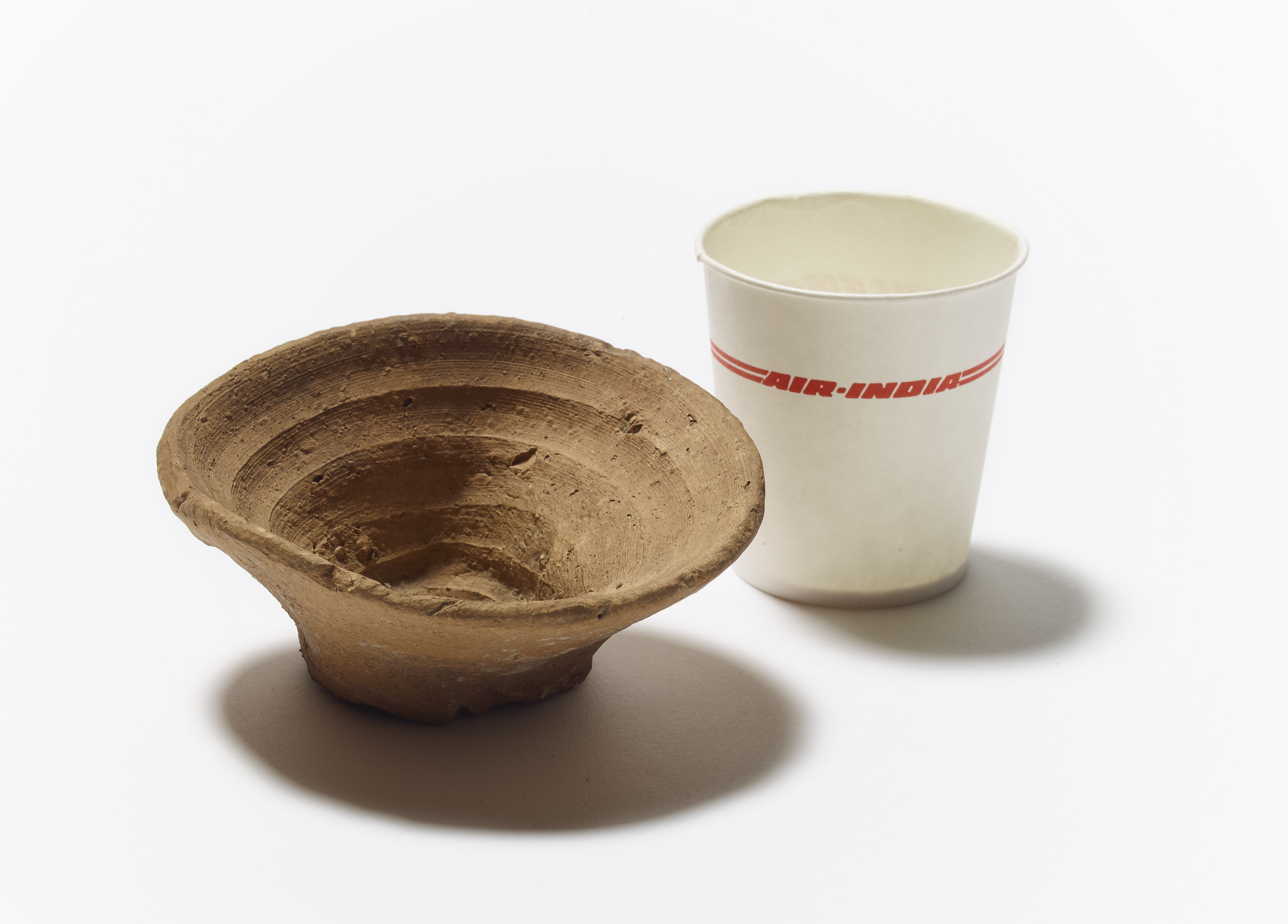 1576710691789-Minoan-cup-alongside-paper-cup-from-Air-India-Photo-The-Trustees-of-the-British-Museum