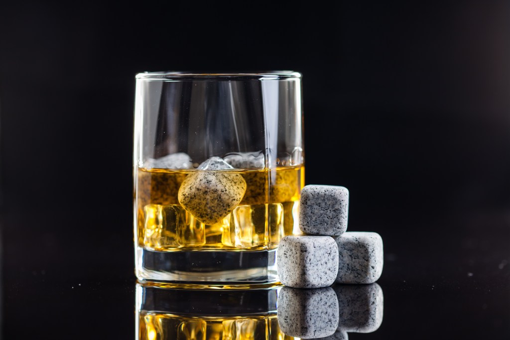 GettyImages-1151729809-glass-of-whiskey-with-whiskey-stones