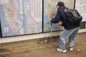 Man with cane puzzled by MTA New York City subway maps