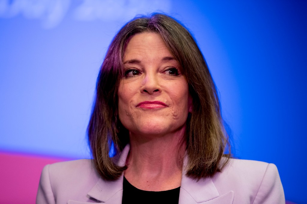 Democratic presidential candidate Marianne Williamson pauses while speaking at a the Faith, Politics and the Common Good Forum at Franklin Jr. High School, Thursday, Jan. 9, 2020, in Des Moines, Iowa. (AP Photo/Andrew Harnik)​