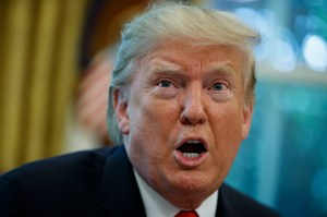 In this Sept. 4, 2019 file photo, President Donald Trump talks with reporters after receiving a briefing on Hurricane Dorian in the Oval Office of the White House in Washington. (AP Photo/Evan Vucci, File)​