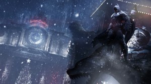 Screenshot from Batman: Arkham Origins, Batman stands on a gargoyle in a snowstorm, a building with christmas lights reading "Season's Greetings" in the background.