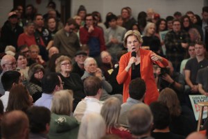 Elizabeth Warren standing in the middle of a crowd.