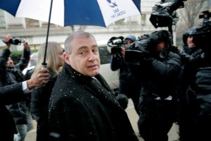 Lev Parnas is surrounded by reporters as he arrives to court in New York