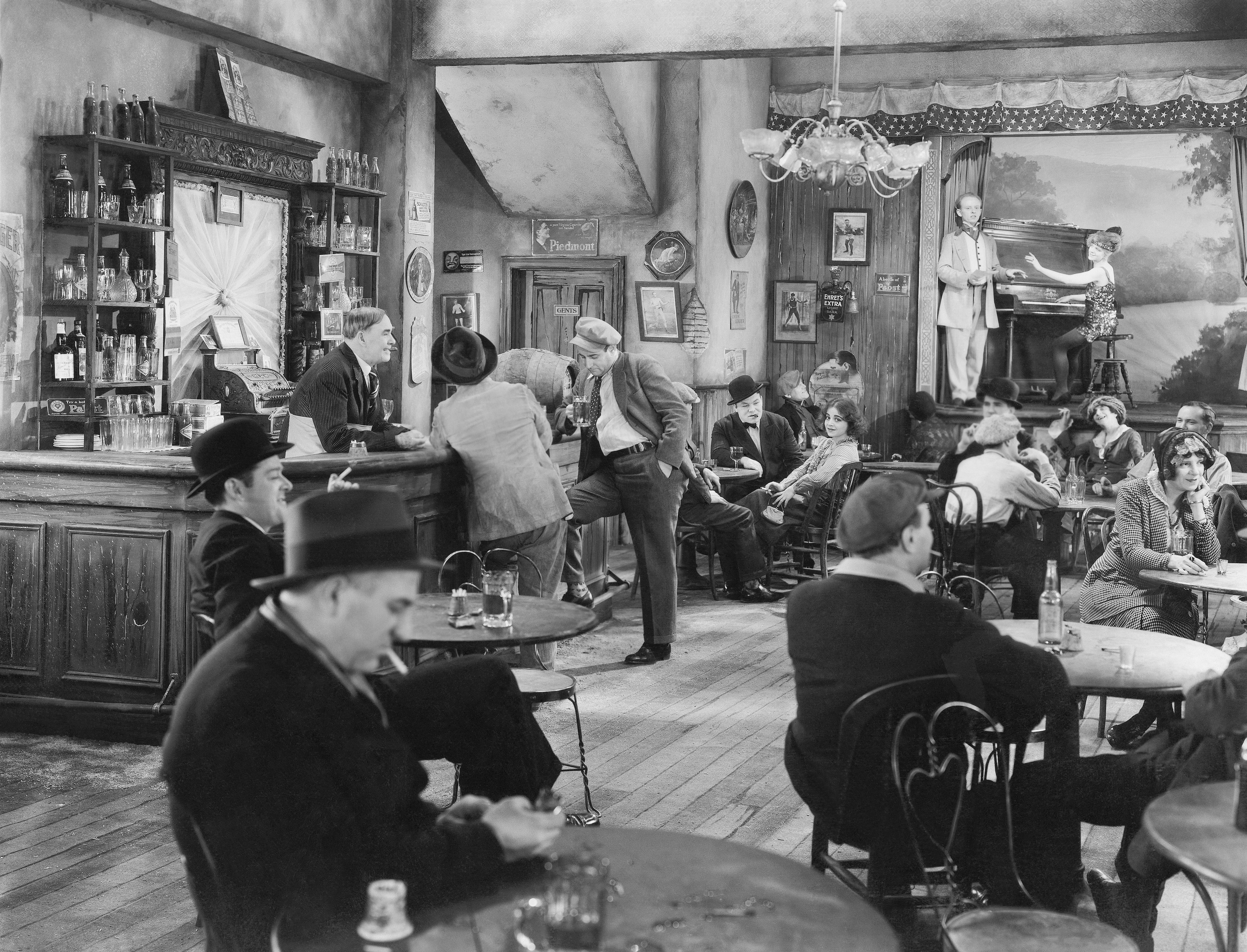 Black and white photo of men in Prohibition era speakeasy