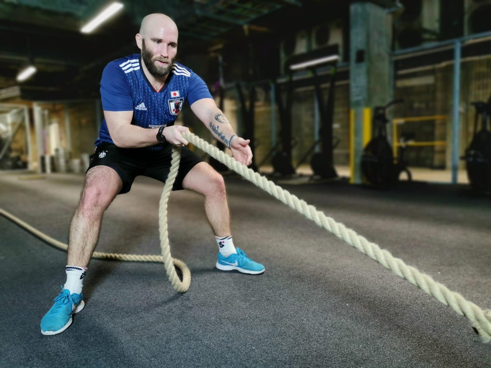 man pulling rope