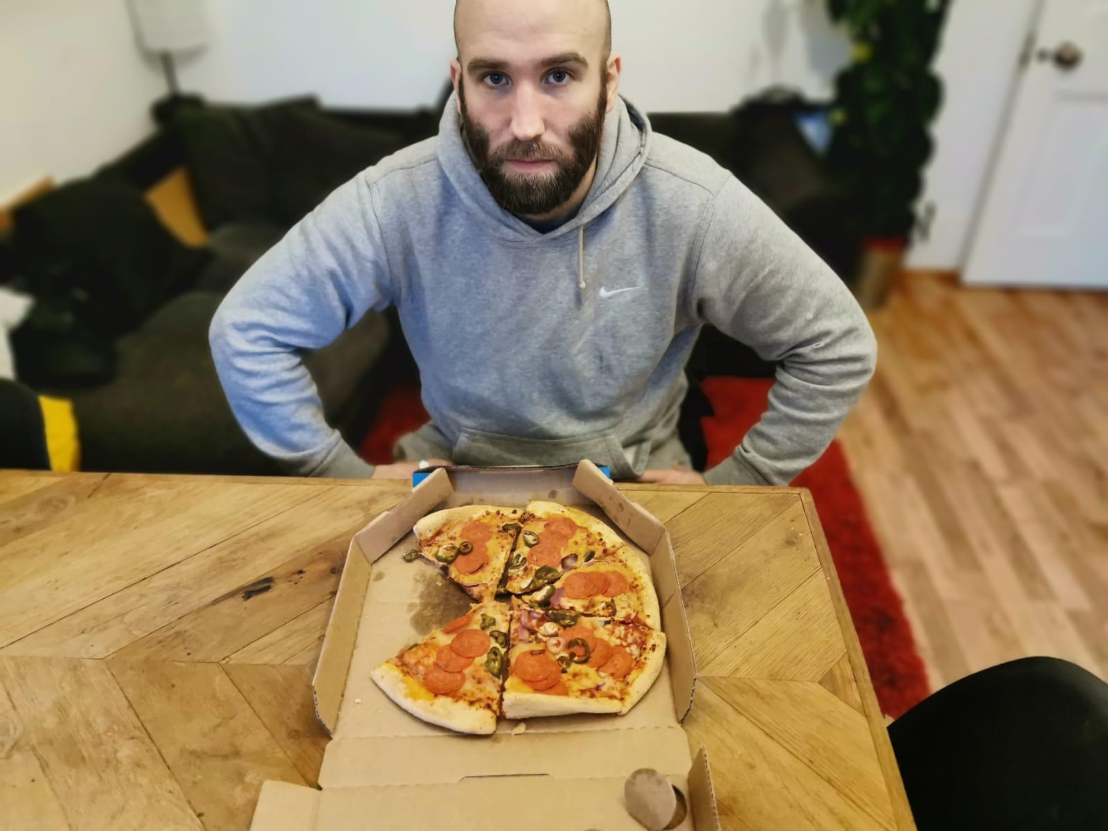 MAN WITH DOMINO'S PIZZA