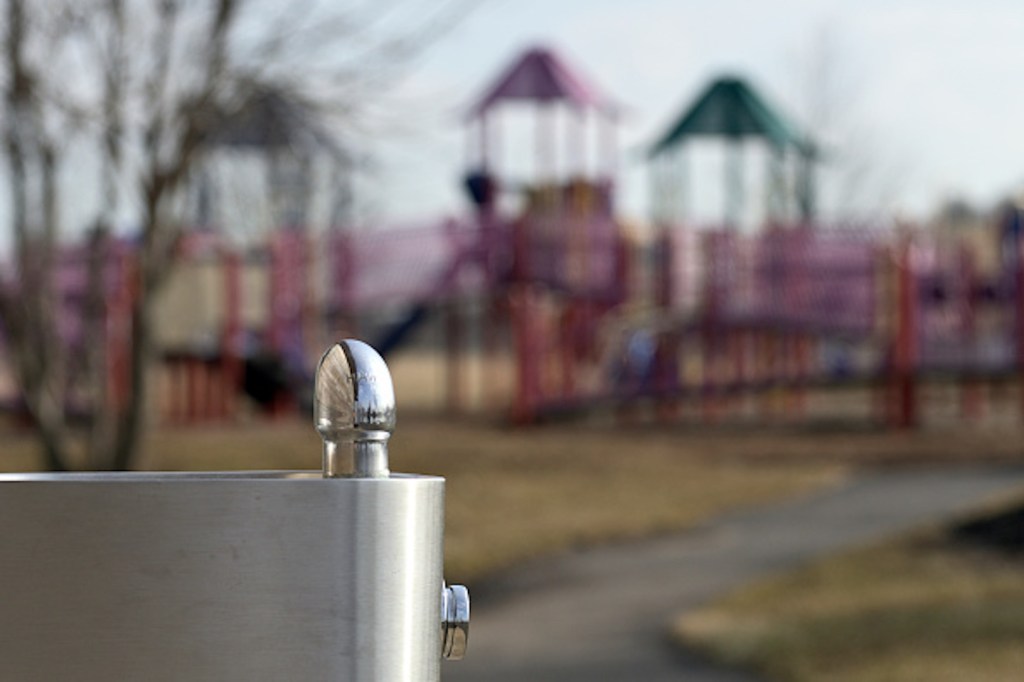 water fountain in front of playground