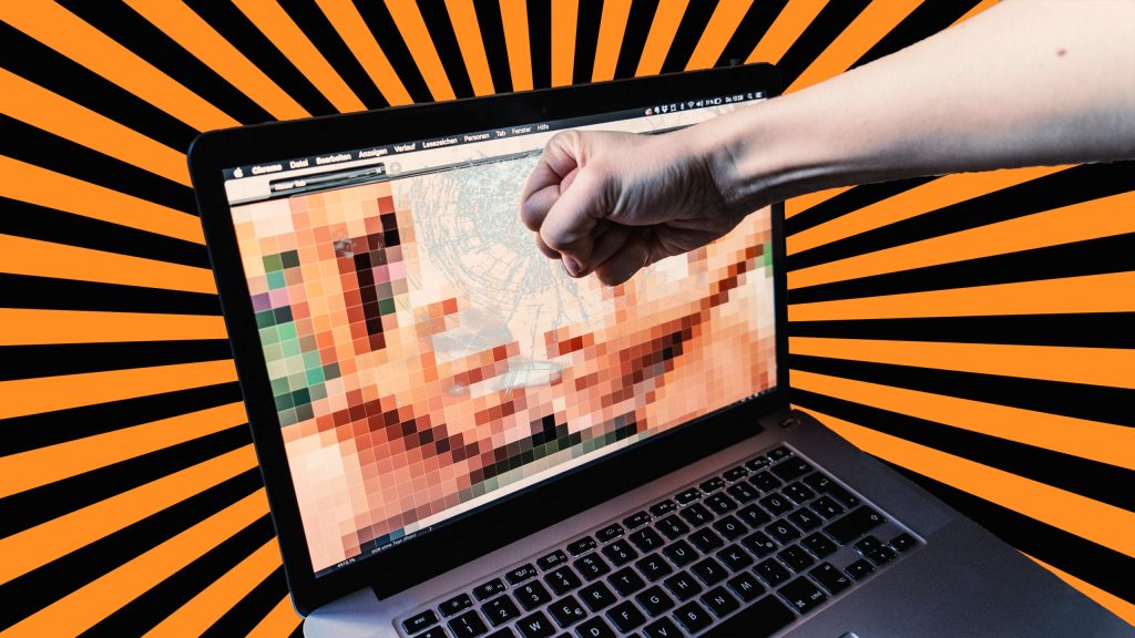 Faust, die einen Laptop-Bildschirm einschlägt, auf dem ein Revenge Porn läuft