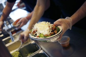 GettyImages-1094154340-burrito-bowl-being-prepared-at-chipotle-restaurant