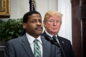 Darrell Scott speaking as Donald Trump looks on.