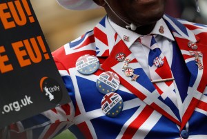 A Brexit supporter demonstrates in Parliament Square in London, Friday, Jan. 31, 2020. Britain officially leaves the European Union on Friday after a debilitating political period that has bitterly divided the nation since the 2016 Brexit referendum. (AP