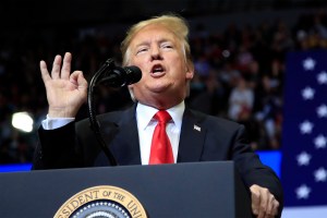 In this Jan. 28, 2020, file photo, President Donald Trump speaks during a campaign rally at the Wildwoods Convention Center Oceanfront in Wildwood, N.J. Trump will be facing his accusers Tuesday night during his State of the Union speech. The impeached pr