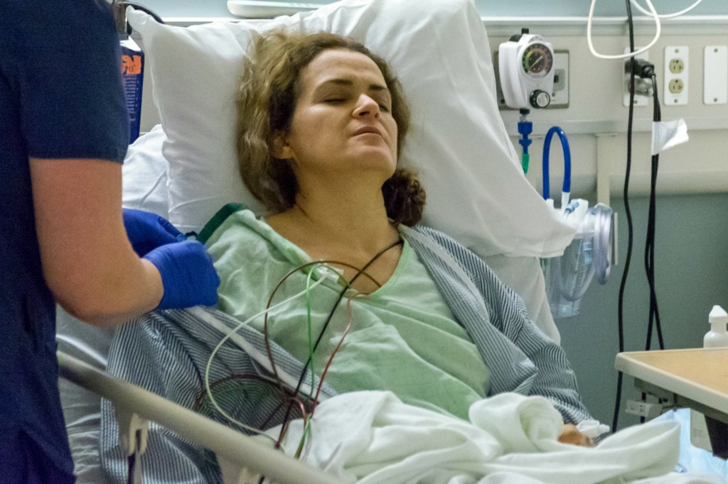 woman-in-hospital-bed-after-surgery