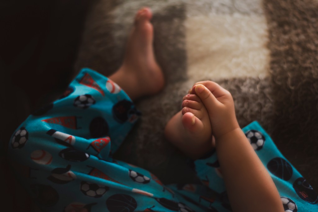 toddler in pajamas sick day