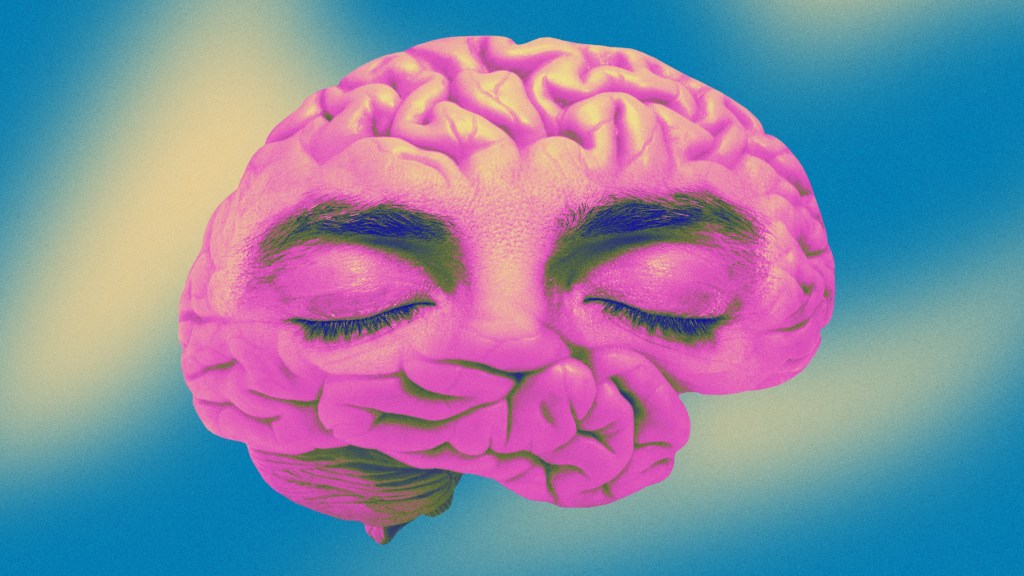 A pink brain with closed eyes