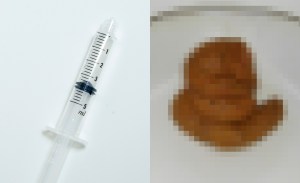 syringe and feces