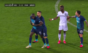 Porto striker Moussa Marega trying to leave the pitch