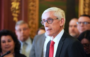 Tony Evers held a press conference to sign an executive order for a special session