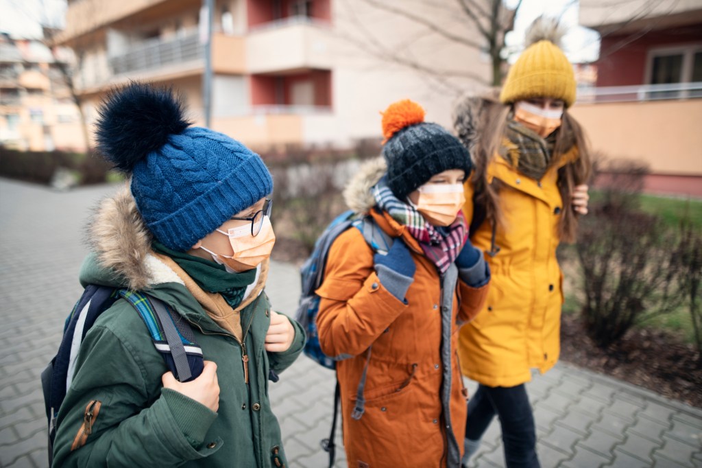 Kids with surgical masks on