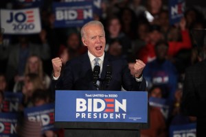 Democratic presidential candidate former Vice President Joe Biden celebrates with his supporters after declaring victory at an election-night rally at the University of South Carolina Volleyball Center on February 29, 2020 in Columbia, South Carolina.