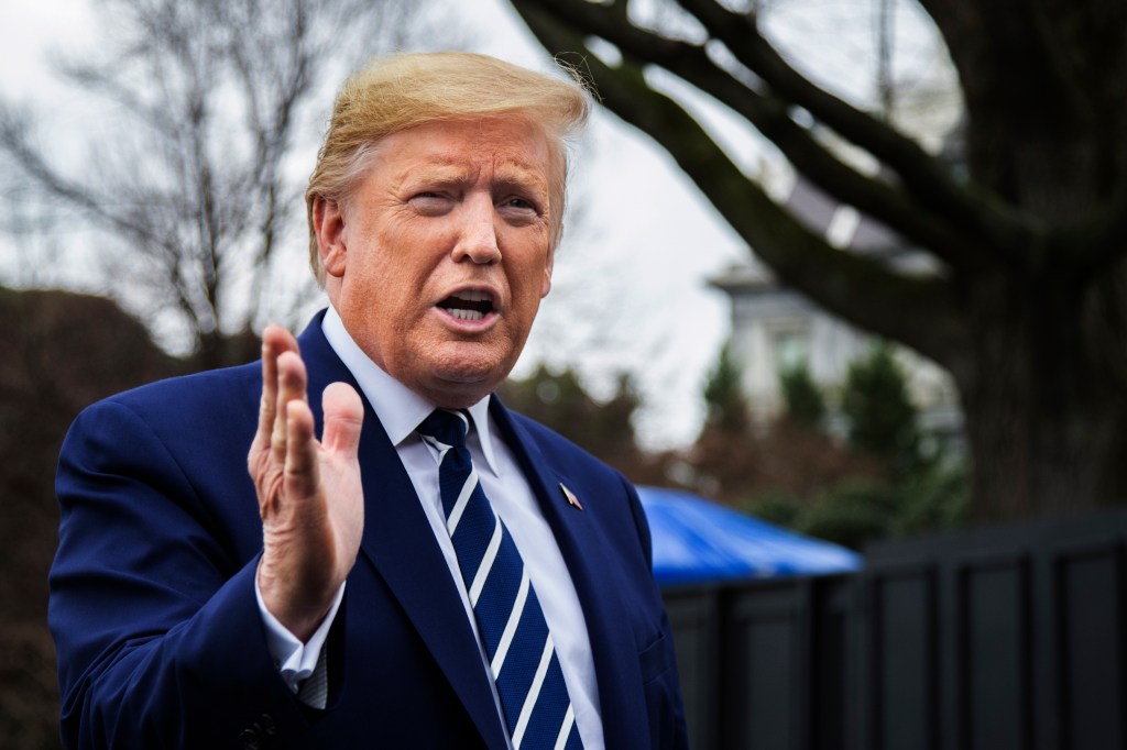 President Donald Trump speaks to members of the media before leaving the White House, Tuesday, March 3, 2020, in Washington, to visit the National Institutes of Health's Vaccine Research Center in Bethesda, Md.