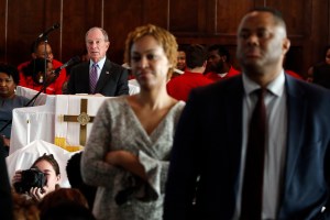 People turn their backs on Democratic presidential candidate and former New York City Mayor Mike Bloomberg as he speaks at Brown Chapel AME church, Sunday, March 1, 2020, in Selma , Ala. (AP Photo/Butch Dill)​