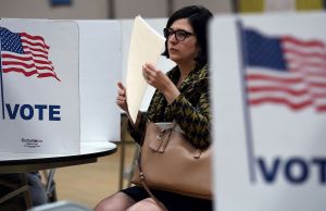 People vote in the Super Tuesday primary at Belvedere Elementary School on March 3, 2020 in Falls Church, Virginia.