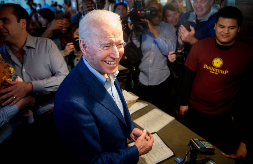 Democratic presidential candidate Joe Biden buys a pie at Buttercup Diner in Oakland, California on March 3, 2020.