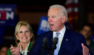 Democratic presidential hopeful former Vice President Joe Biden accompanied by his wife Jill Biden, speaks during a Super Tuesday event in Los Angeles on March 3, 2020.