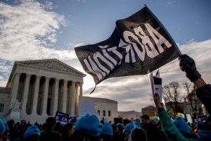 Abortion rights demonstrators and foes rally outside the Supreme Court, in Washington, Wednesday, March 4, 2020, as the court takes up the first major abortion case of the Trump era Wednesday. (AP Photo/Andrew Harnik)