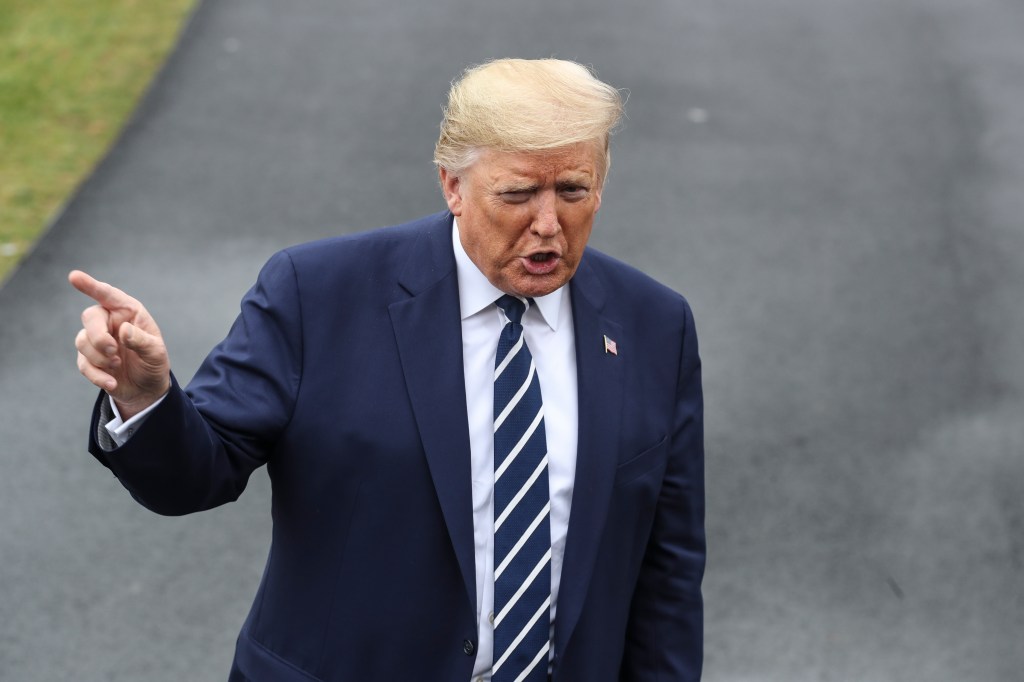 President Donald Trump talks to members of the media on the South Lawn of the White House before boarding Marine One on March 3, 2020 in Washington, DC.