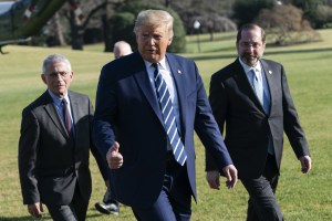 U.S. President Donald Trump, center, Alex Azar, secretary of Health and Human Services (HHS), right, and Anthony Fauci, director of the National Institute of Allergy and Infectious Diseases, arrive at the White House in Washington, D.C., U.S., on Tuesday,