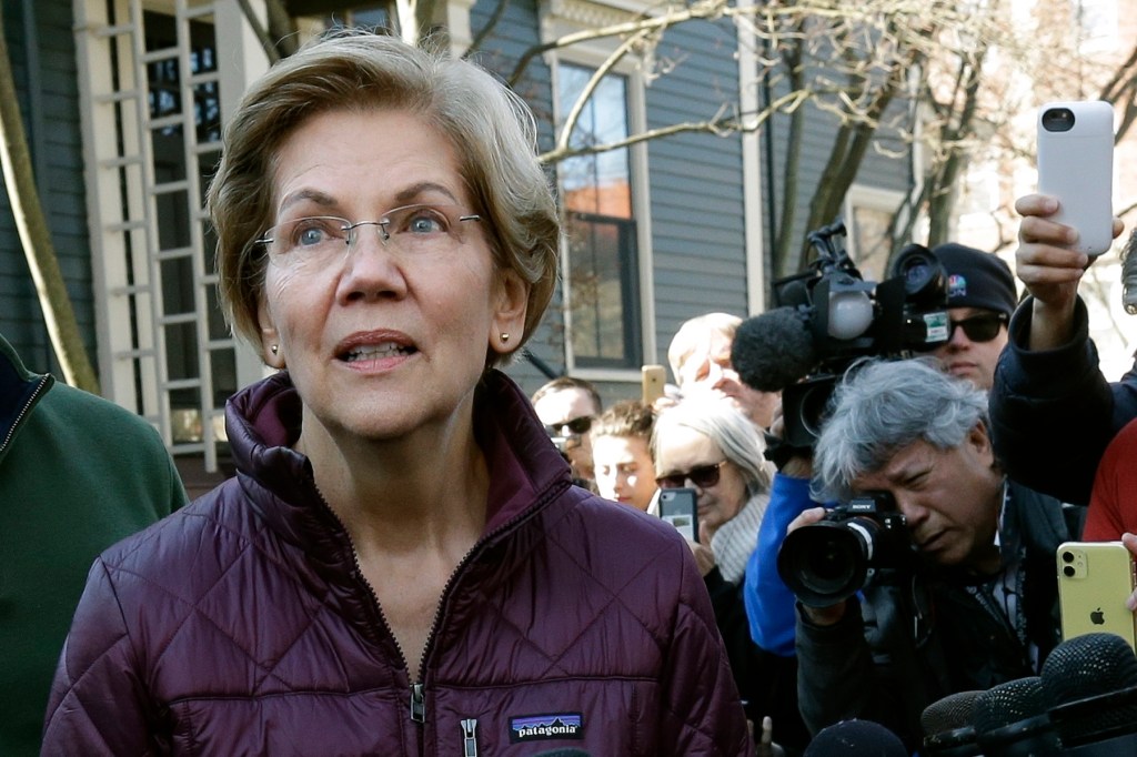 Sen. Elizabeth Warren, D-Mass., pauses while speaking outside her home, Thursday, March 5, 2020, in Cambridge, Mass., after she dropped out of the Democratic presidential race. (AP Photo/Steven Senne)