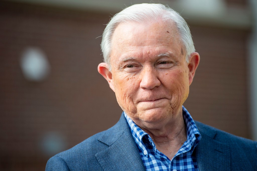 Jeff Sessions talks with the media after voting in Alabama's primary election, Tuesday, March 3, 2020, in Mobile, Ala.