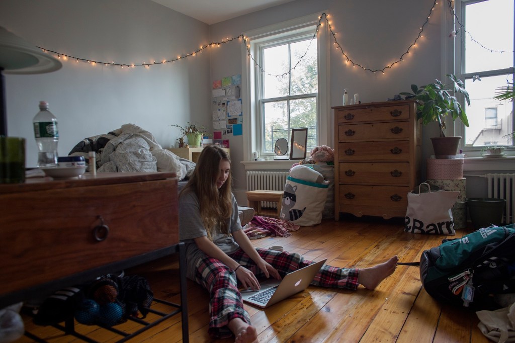 A sophomore at Brooklyn Friends School checks into her classes remotely from home after the school announced that it will be closed due to concerns about the coronavirus, March 11, 2020 in Brooklyn, New York.