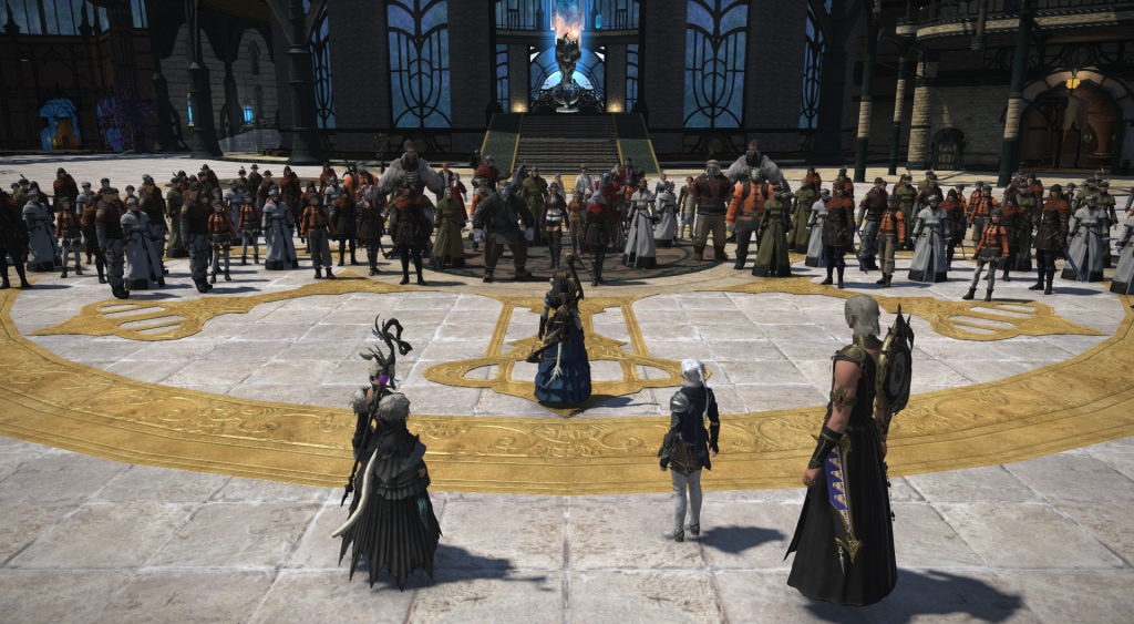 A gathering of characters in a public square in Final Fantasy XIV