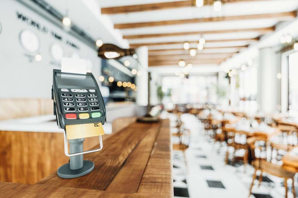 point of sale system at an empty clean cafe restaurant