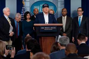 US President Donald Trump gives a press briefing about the Coronavirus (COVID-19) alongside members of the Coronavirus Task Force