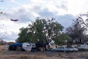 Homeless encampment, RV, tents and mobile homes can be seen near Guadalupe River in San Jose, California, United States on Wednesday, November 27, 2019.