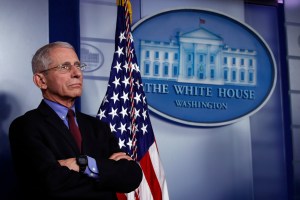 Dr. Anthony Fauci, director of the National Institute of Allergy and Infectious Diseases, listens during a briefing about the coronavirus