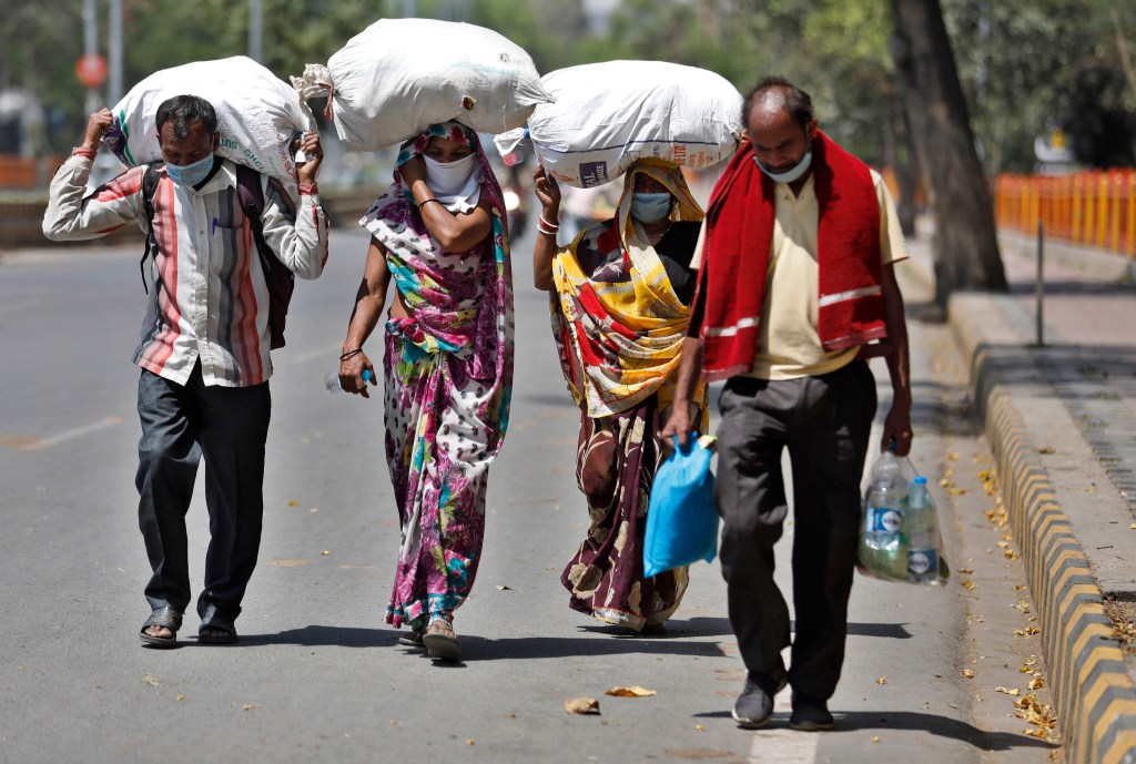 india migrant workers bleach coronavirus