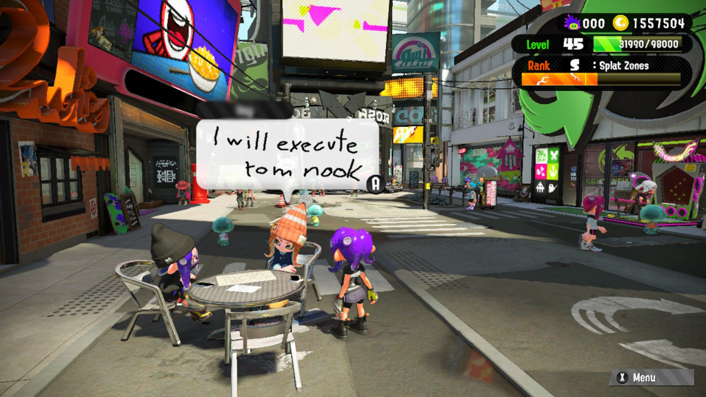 A group of Splatoon characters sit at a table where one of them says in a speech bubble, "I will execute Tom Nook."