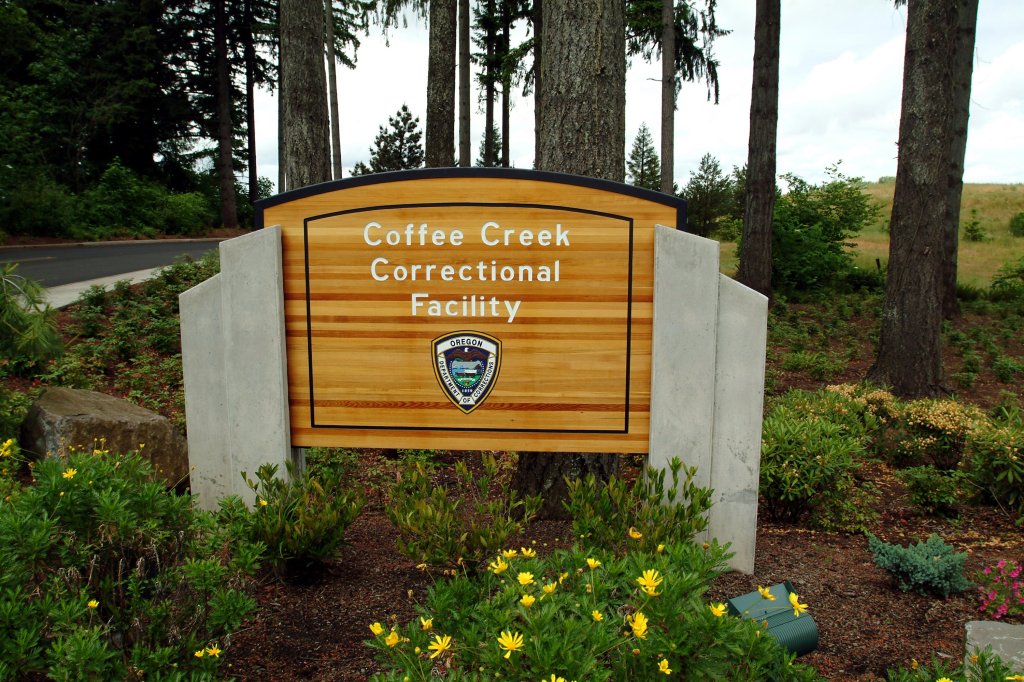 A photo of the entrance sign at Coffee Creek Correctional Facility