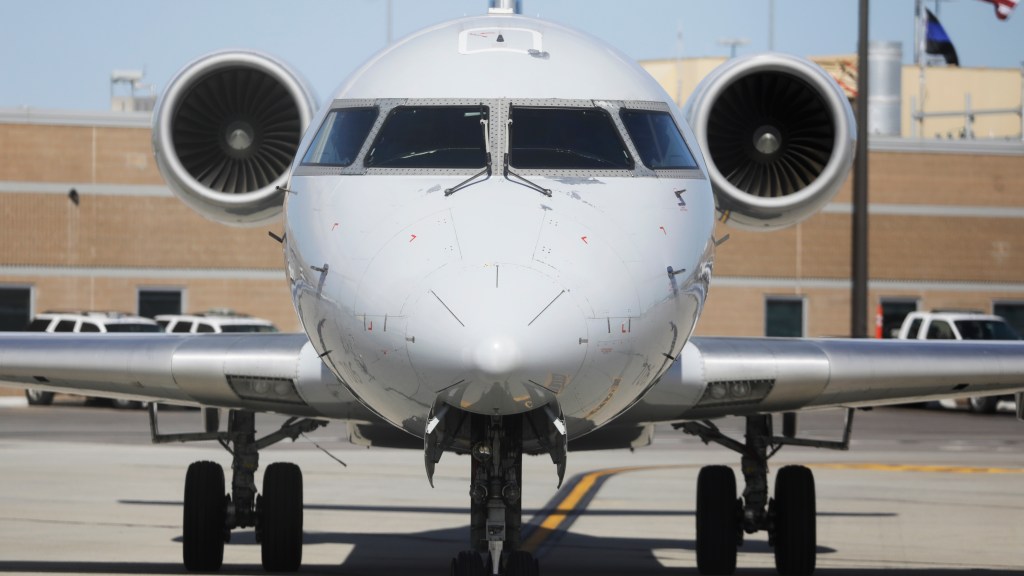 A plane sits on the tarmac at Salt Lake City International Airport Tuesday, April 7, 2020, in Salt Lake City. (AP Photo/Rick Bowmer)​