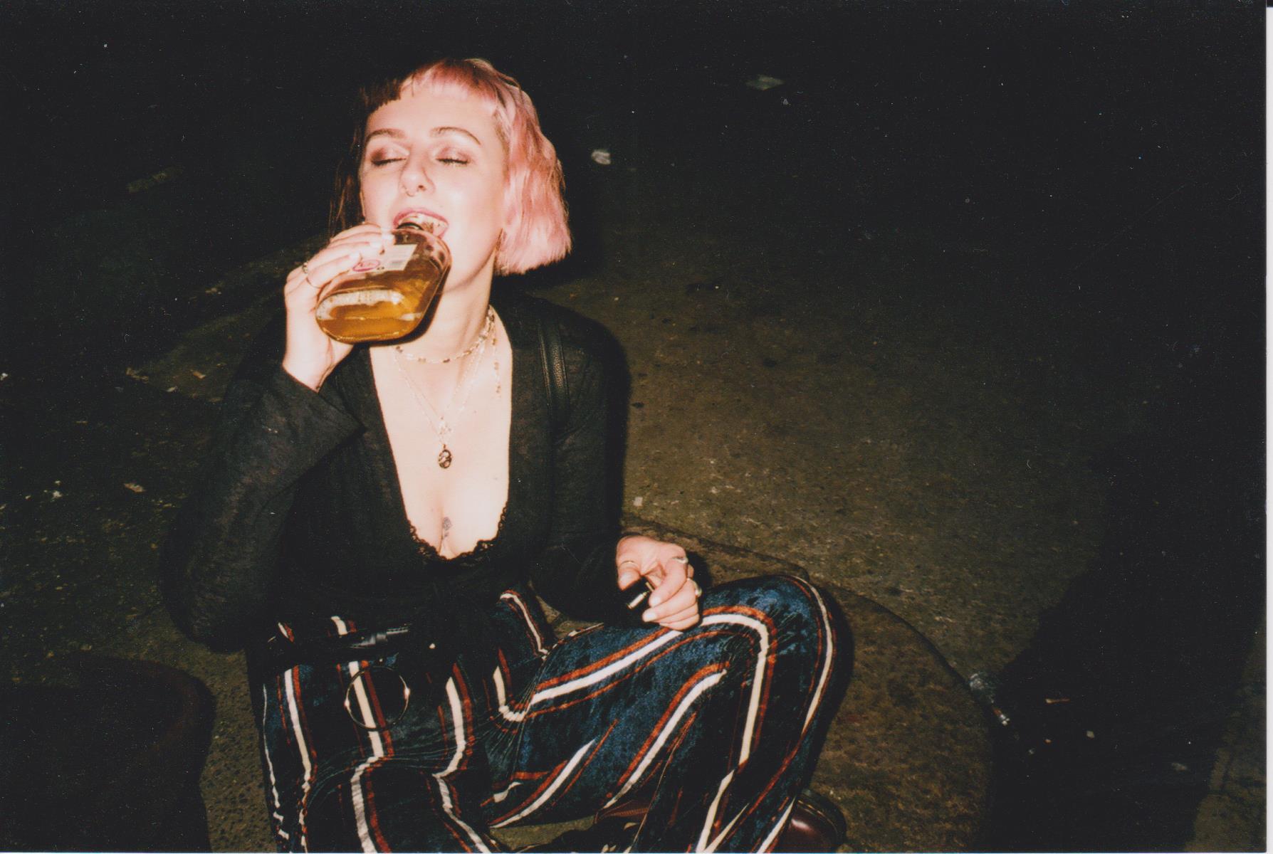 Woman drinking alcohol