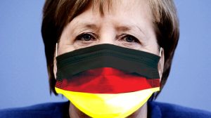 Merkel mit Deutschlandmaske